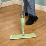 A Person using Ewbank Spray Mop