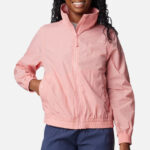 A Person wearing Columbia Womens Windbreaker Jacket in Salmon Rose Color