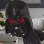 A Person wearing Star Wars Darth Vader Electronic Mask