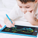 A child drawing on a Hockvill Magic Doodle Board