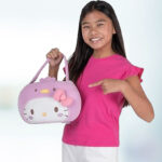 A girl holding a Hello Kitty Plush Pail