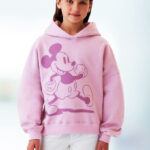 A girl wearing a GAP x Disney Kids Mickey Mouse Hoodie