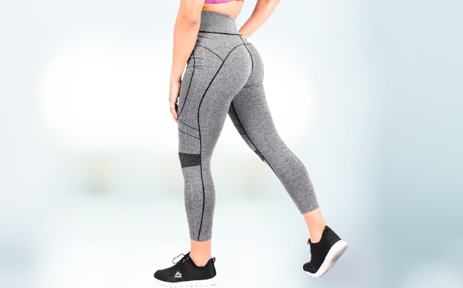 A lady wearing a Tirrinia Womens Tummy Yoga Pants