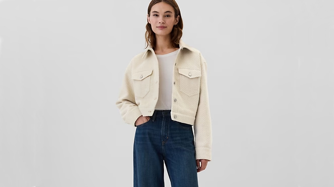 A person wearing a GAP Womens Relaxed Cropped Icon Jacket