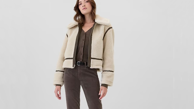 A person wearing a GAP Womens Relaxed Sherpa Coat