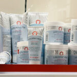 First Aid Beauty Ultra Repair and Firming Creams in shelf