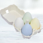 Happy Place Space Freshening Eggs 4 Pack on a Table