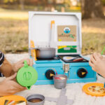 Kids playing with Melissa Doug Camp Stove Play Set