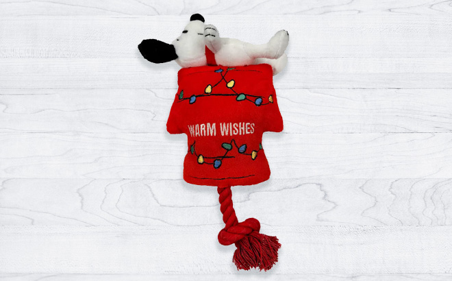 Licensed Character Holiday Peanuts Snoopy Dog House Rope Dog Toy on the Table