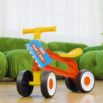 Little Tikes Scoot N Steer Ride On Toy in a Room