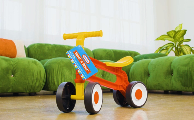 Little Tikes Scoot N Steer Ride On Toy in a Room