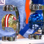 Pegasus Sports NFL Mini Chrome Hover Helmets on a Table