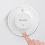 X Sense Smoke Alarm on the Wall