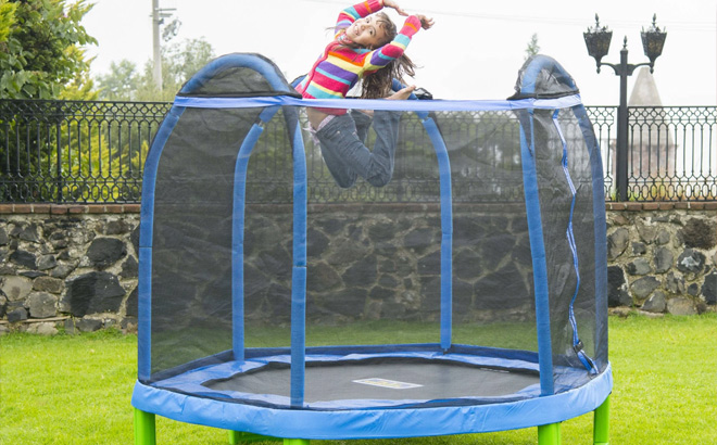 a Kid Playing in the Trampoline