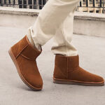 a Person Wearing Koolaburra by UGG Mens Suede Mini Boots