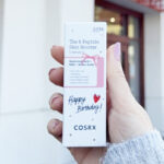 A Person Holding a COSRX Serum Birthday Gift