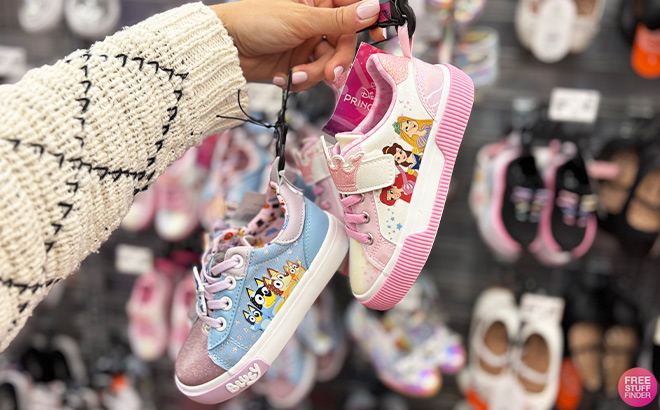 A Person Holding Bluey Disney Toddler Shoes