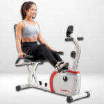 A lady exercising on a Marcy Recumbent Exercise Bike