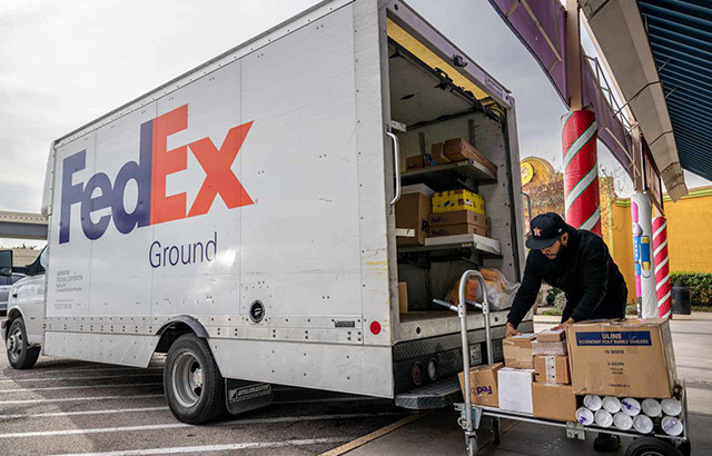 FedEx Worker Loading Stuff Into a Van