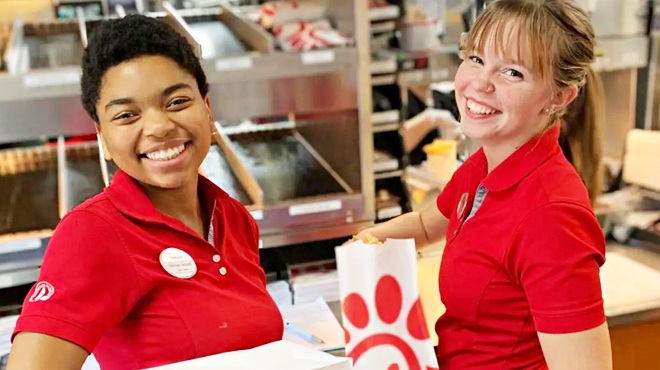 Two Smiling Chick Fil A Employees at Work