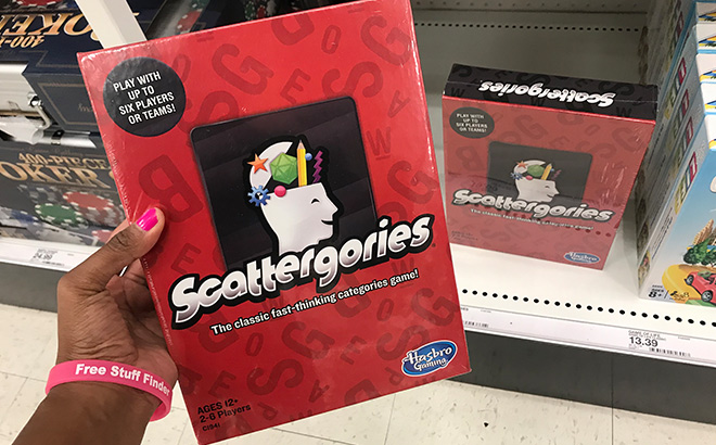 A Hand Holding Scattergories Board Game