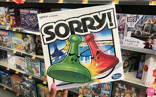 A Hand Holding the Sorry Board Game