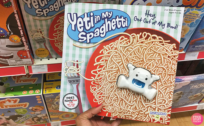 A Hand Hollding Yeti in my Spaghetti Board Game