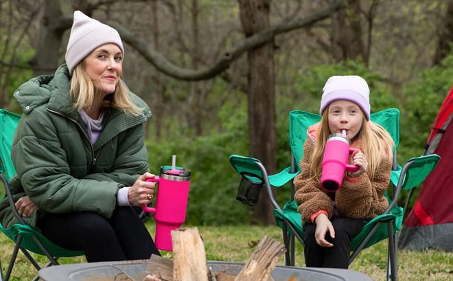 A Mom With Her Daughter Holding A 40 Ounce Ozark Trail Tumbler