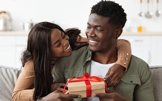 Sister Giving Her Brother a Gift