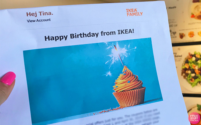 A Hand Holding a Birthday Card from Ikea