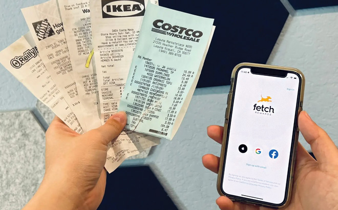 A Person Holding Receipts in Their Left Hand and Phone with Fetch App in Their Right Hand